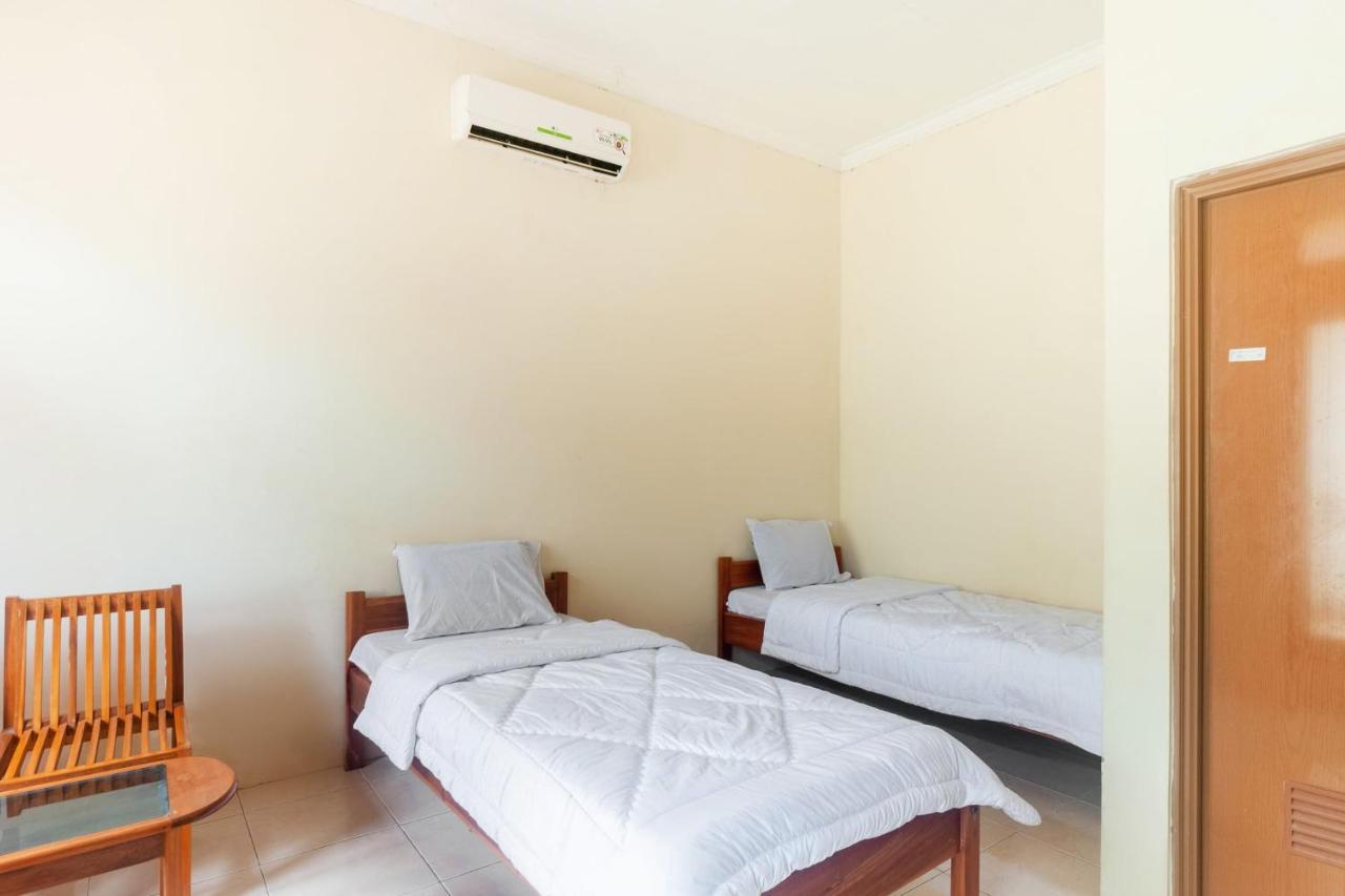 Oyo 2471 Swarna Raya Hotel Sawarna Ngoại thất bức ảnh